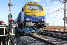 Estado en el que quedó el vehículo bajo el tren